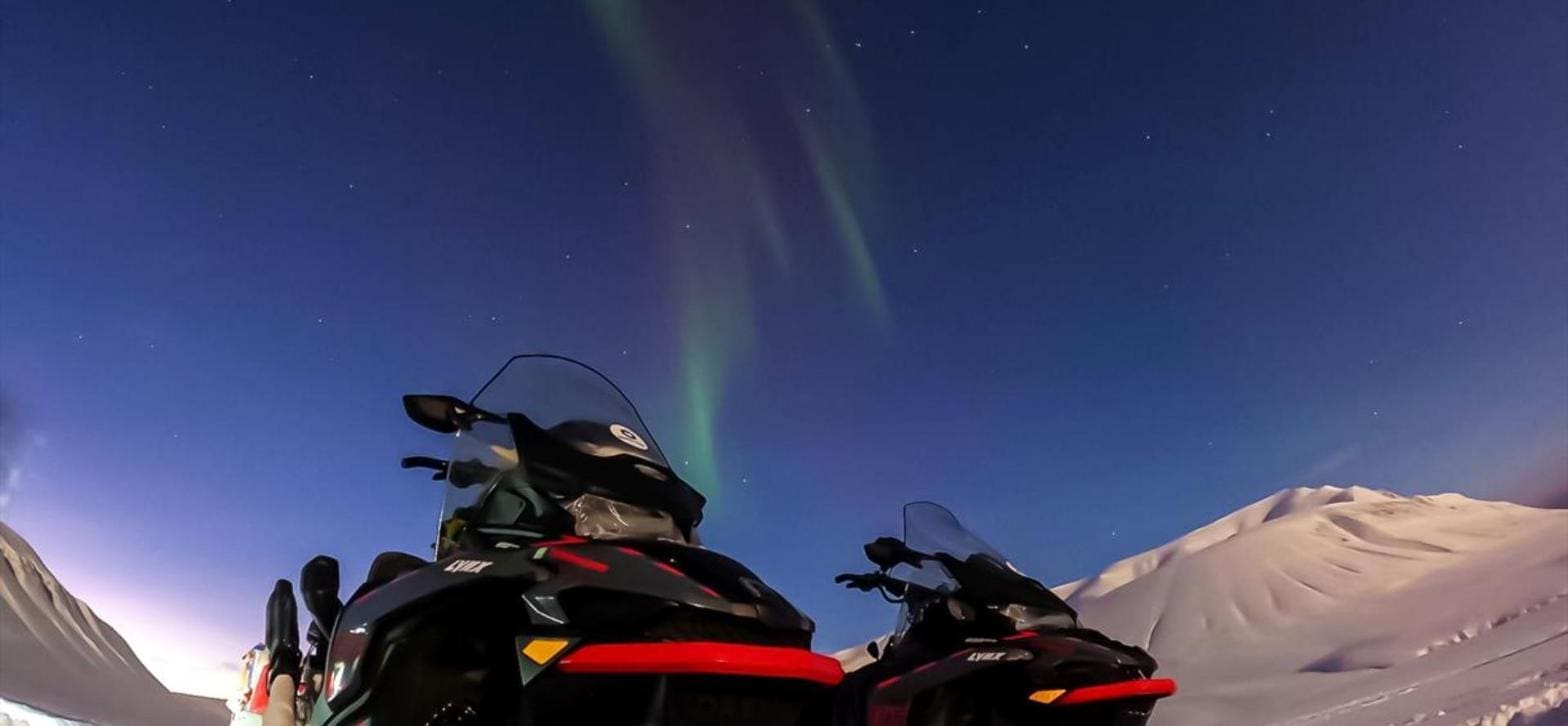 Polar Night Snowmobile to the Ice Pingo
