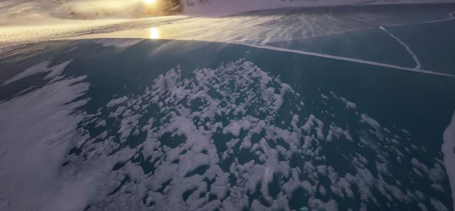 Polar Night Snowmobile to the Ice Pingo